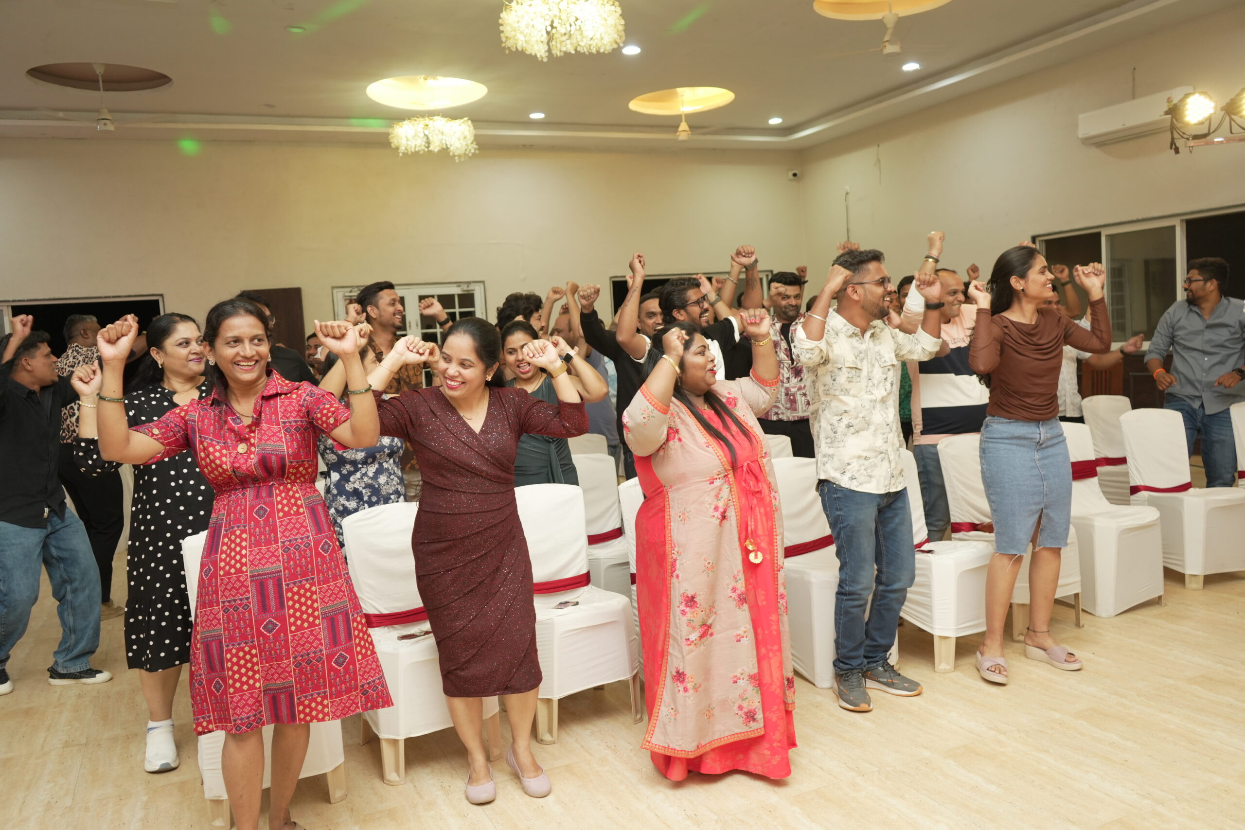 Rental Bunny employees enjoying a fun dance activity during the team picnic
